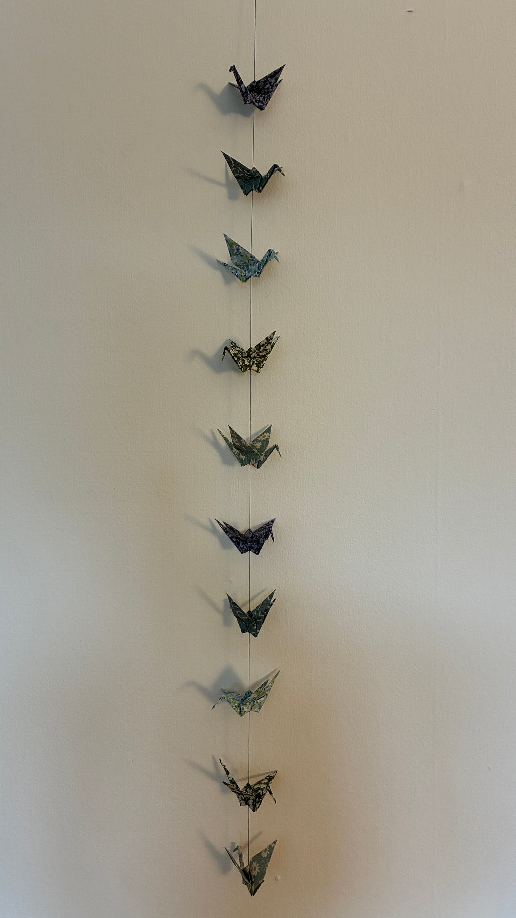 guirlande grues vert-bleu floral