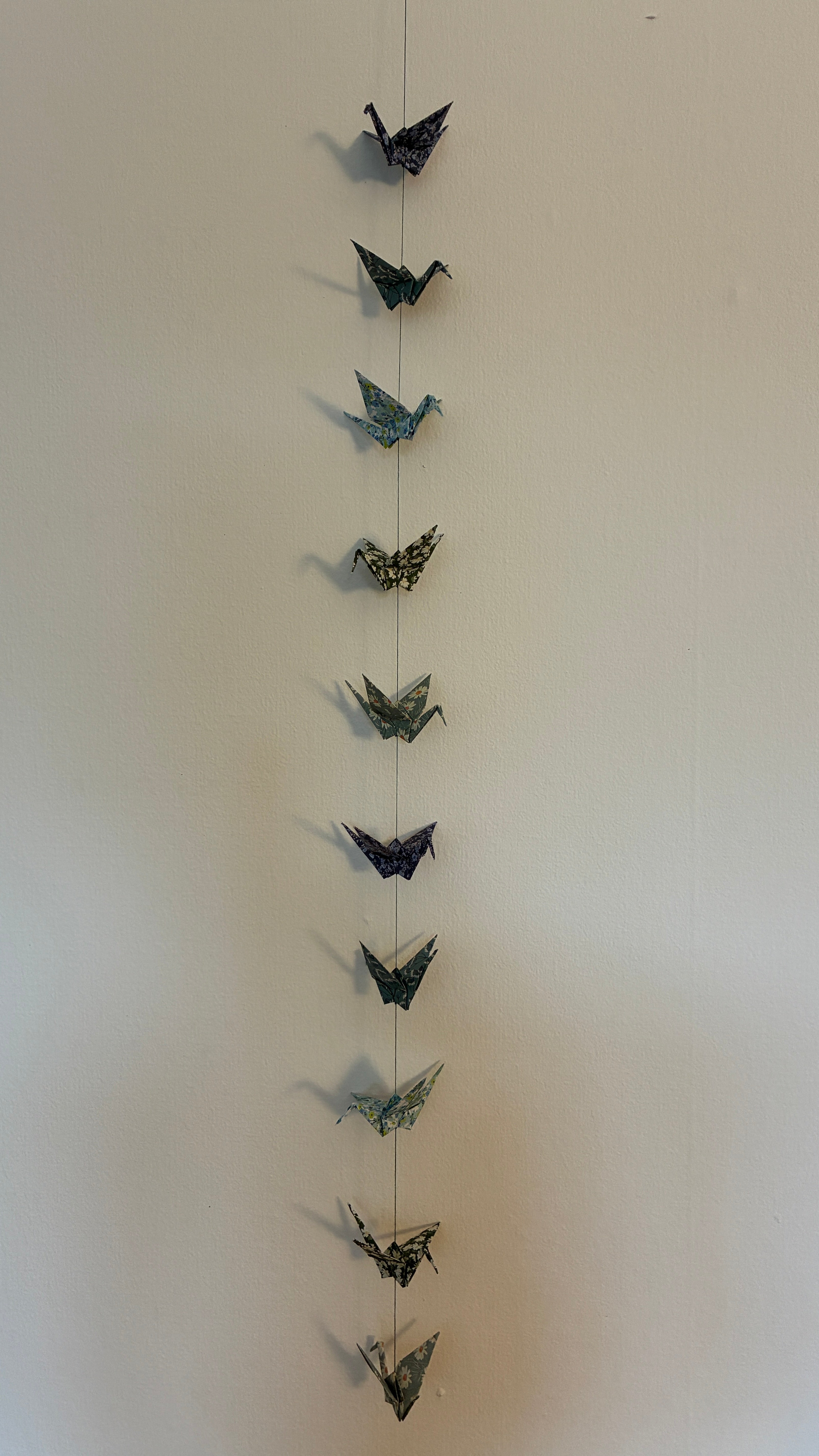 guirlande grues vert-bleu floral